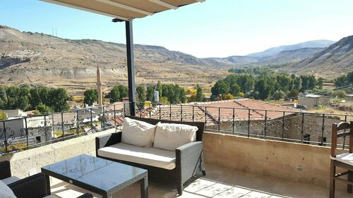 Monte Cappa Cave House, Prenota Hotel  
