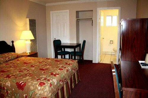Sunset Inn and Suites West Sacramento, Забронировать Мини-отель Уэст-Сакраменто Калифорния