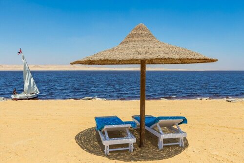 Byoum Lakeside Hotel, Забронировать Отель Отели Qaryat at Ta‘mīr as Siyāḩīyah с парковкой, Парковка