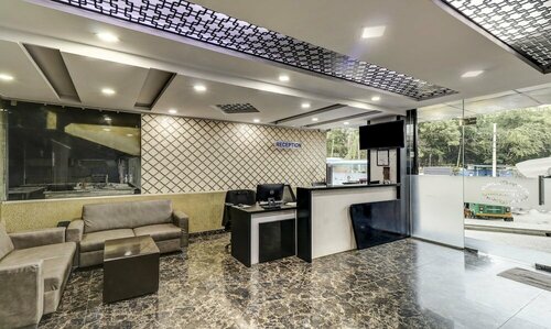 Treebo Sahara Suites 750M From St Johns Medical College And Hospital, Забронировать Отель BTM Layout Бангалор, рядом с Торговый центр The Forum