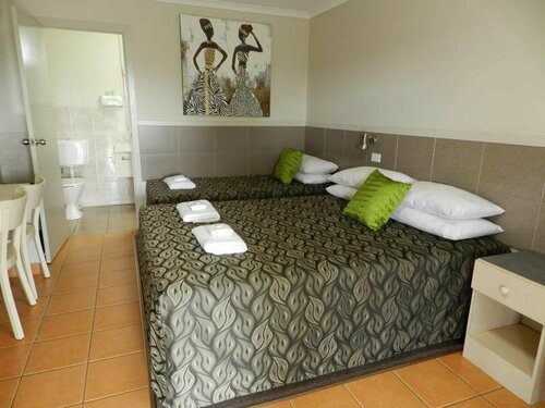 Golden Palms Motor Inn, Забронировать Мини-отель Отели Бандаберг 4 звезды, 4*