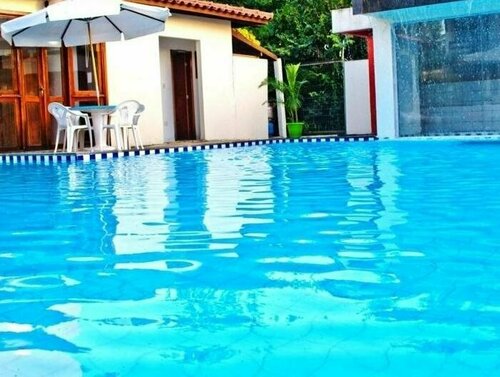 Residencial Nazareth, Забронировать Отель Отели Praia de Taperapuan с парковкой, Парковка