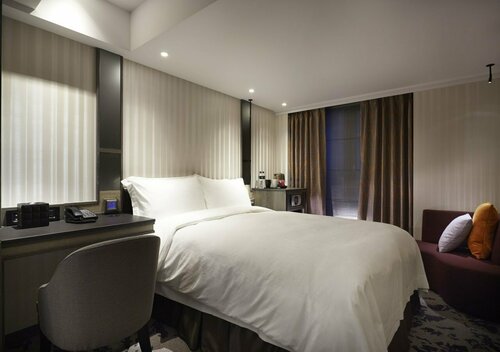 At Home Hotel Ximen, Boek Hotel Taybey China
