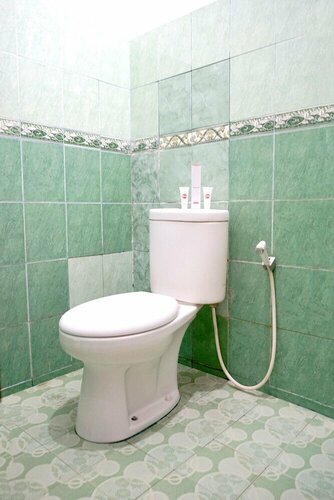 OYO 1697 Griya Dimas Guesthouse, Забронировать Отель Отели в центре Джамби, в центре