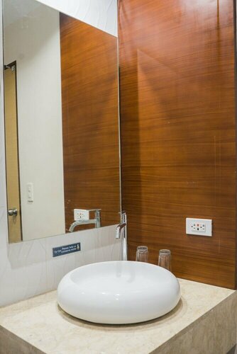 Bed and Bath Serviced Suites, Забронировать Отель Илоило Илоило