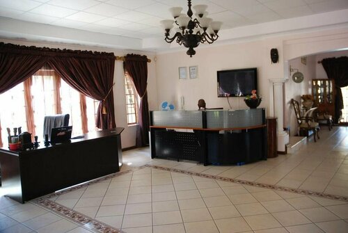 Paulas Guesthouse, Buchen Sie Hotel Rustenburg 