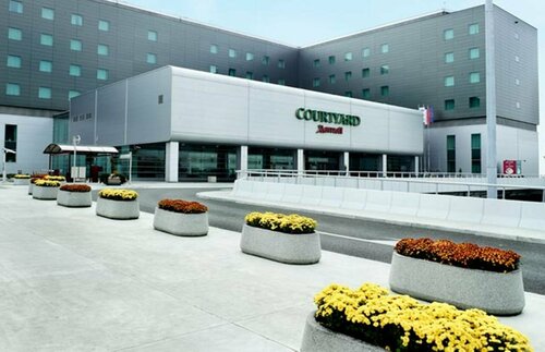 Courtyard by Marriott Warsaw Airport, Book Hotel Hoteller i Masovia med parkering, Parkering