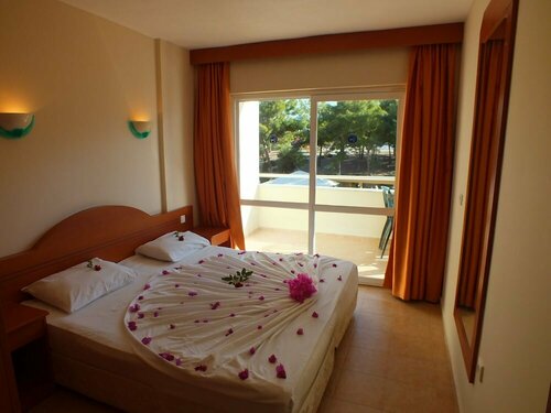Апарт-Отель Tuntas Family Suites Kusadasi, Забронировать Апарт-отель Апарт-отели Кушадасы, Апарт-отель