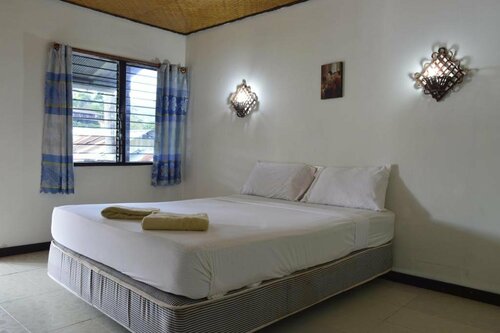 Lux Guesthouse, Забронировать Отель о. Пхи-Пхи Краби, рядом с Паромный причал Тонсай