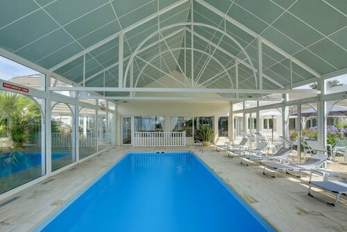 LOGIS Hôtel ARCADIA, Забронировать Отель Ланьон Granit Rose Coast