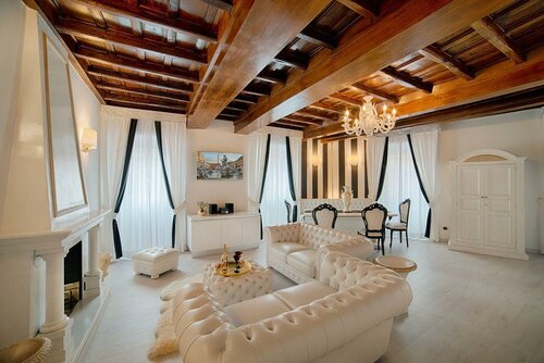 Tolentino Suites