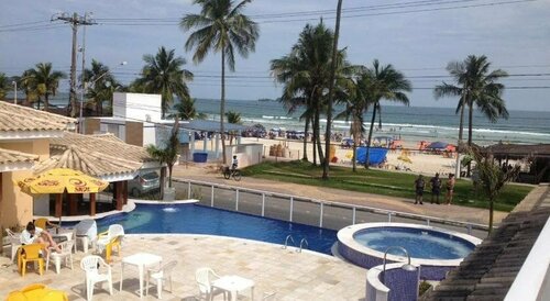 Jequitiba Hotel Frente ao Mar, Забронировать Отель Гуаружа муниципалитет Гуаружа, рядом с Acqua Mundo Aquarium