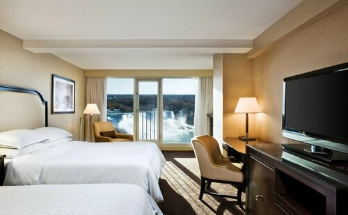 Sheraton Fallsview Hotel, Забронировать Отель Бизнес-отели Ниагара Фолс, рядом с Крытый аквапарк Фоллсвью, 4* 5*