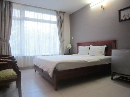 Romance Hotel Phu My Hung, Забронировать Отель Отели Хошимина с парковкой, рядом с RMIT University Vietnam, Парковка