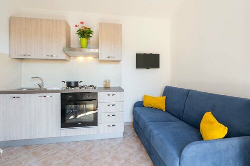 Residence La Falata Costa Paradiso, Забронировать Отель Тринита-д'Агульту-э-Виньола Коста-Парадизо