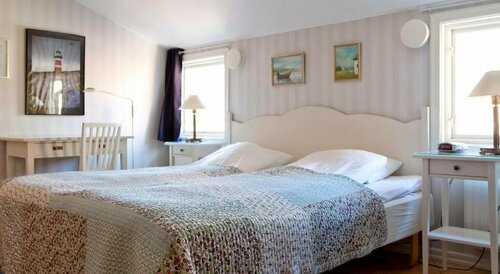 Hotell St Clemens, Забронировать Отель Отели Висбю с парковкой, рядом с Паромный причал Висбю, Парковка
