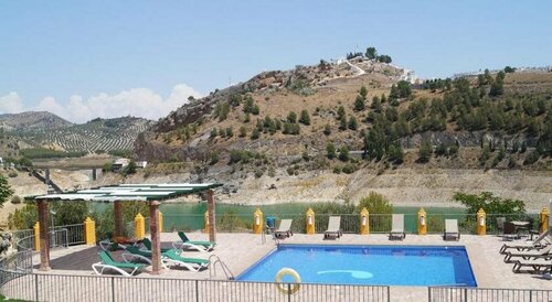 Caserio de Iznájar, Забронировать Отель Иснахар Cordoba Province, рядом с Церковь апостола Сантьяго