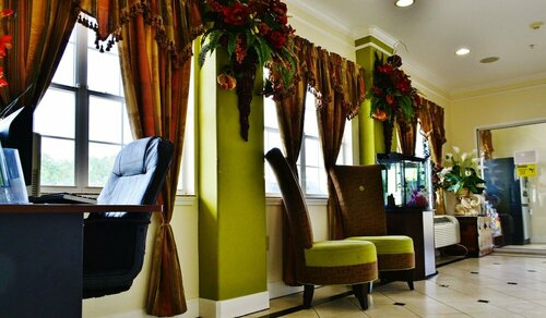 Scottish Inn and Suites Alvin, Book Mini-hotel Hoteller i Houston med parkering, Parkering