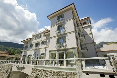Hotel Al Campanile - Luxury Suites & Apartments, Забронировать Апартаменты/квартира Лавено Provincia di Varese