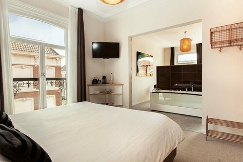 La Paulowna Boutique Hotel, Забронировать Бутик-отель Отели Южной Голландии 3 звезды, 3*