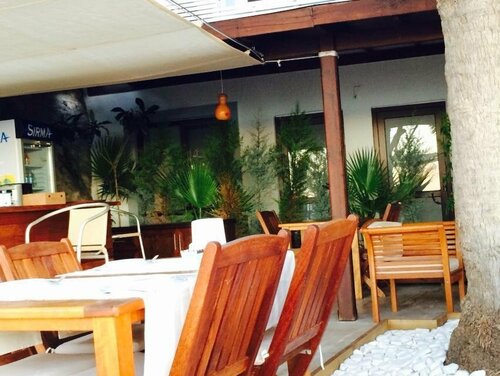 Gunisigi Otel, Забронировать Отель Гёльтюрбюку Бодрум, рядом с Пляж Голькой