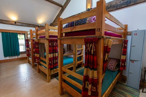 Holifield Farm Hostel & Community Project, Забронировать Фермерский дом Хелстон Корнуолл