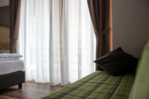 DolceVita Ambiez B&B, Забронировать Отель «постель и завтрак» Сан-Лоренцо-Дорсино Италия