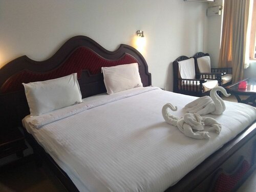 Indraprastha Beach Resort, Забронировать Курортный отель Отели Варкала с завтраком, рядом с Janardhanaswamy Temple, Завтраки
