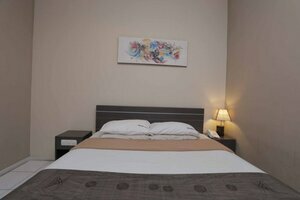 The Sunset Point Hotel by RedDoorz, Забронировать Отель Отели Семиньяк с питанием, Пансион
