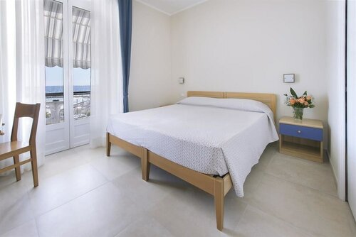 Albergo Teresa, Забронировать Отель Отели Лайгуэлья с завтраком, Завтраки