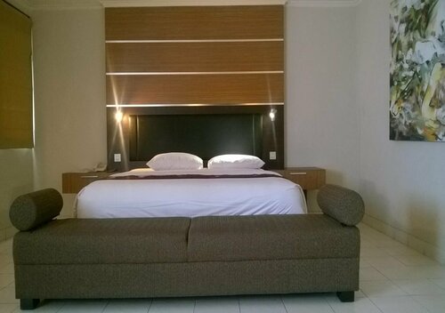Urbanview Hotel Taman Suci Denpasar Bali, Забронировать Отель Денпасар Denpasar Municipality, рядом с Площадь Пупутан Бадунг