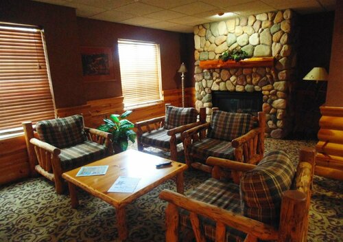 American Inn and Suites Houghton Lake, Book Hotel Hoteller i Michigan med parkering, Parkering