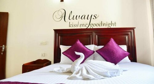 Cinnamon Holiday Inn, Забронировать Отель Хиккадува 