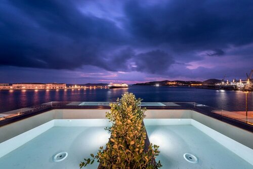 Shapes Luxury Suites, Забронировать Гостевой дом Гостевые дома Эрмуполиса, Гостевой дом