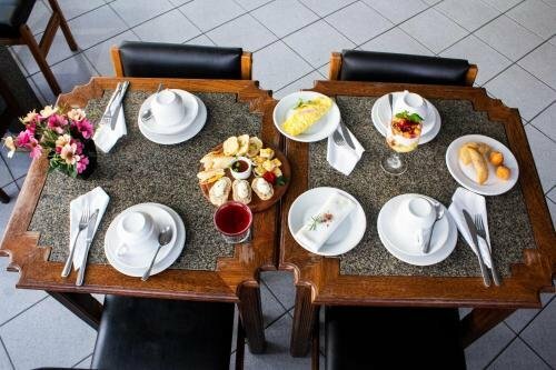 Hotel das Palmeiras, Забронировать Отель Отели и гостиницы Теофилу-Отони, Отель