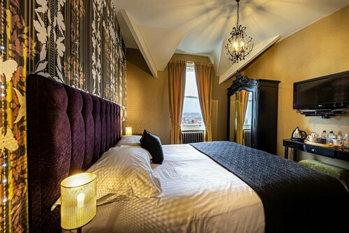 Escape Boutique B&B, Забронировать Отель «постель и завтрак» Отели Лландидно с парковкой, рядом с St. Mary &amp; St. Abaskhyron's Coptic Orthodox Church, Парковка