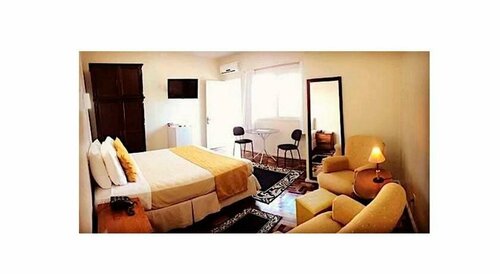 Hotel Ibiá, Забронировать Отель Черногория Риу-Гранди-ду-Сул