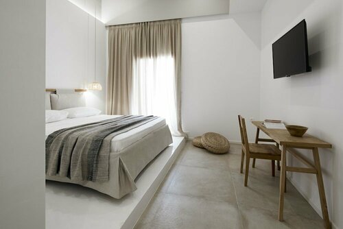 Arco Solium Suites, Забронировать Отель Отели и гостиницы Адамас, рядом с Милосский музей горного дела, Отель