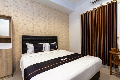 Ndalem Kopen Syariah by Oyo Rooms, Book Hotel Hoteller i Sleman med parkering, Parkering