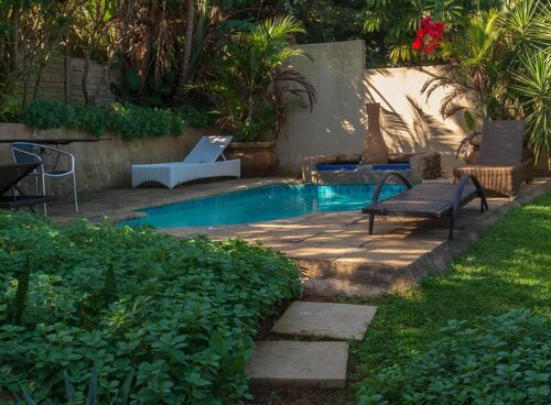 Ekhaya Guest House, Забронировать Гостевой дом Гостевые дома Баллито, рядом с Пляж Thompson's Bay Beach, Гостевой дом