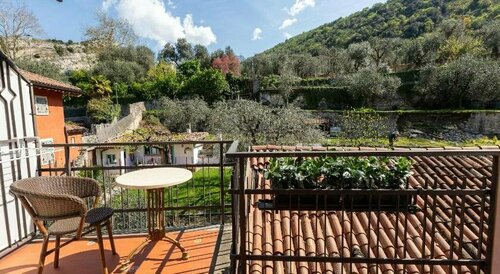 Appartamenti Nataly, Забронировать Отель Торболе Alto Garda e Ledro