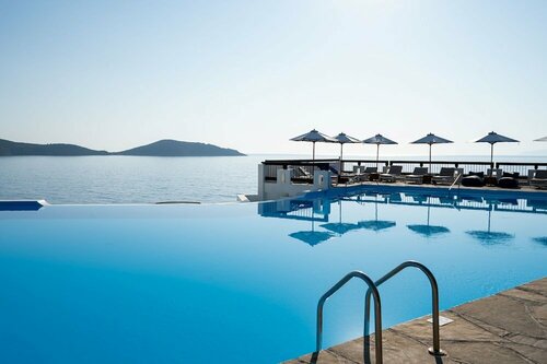 Курорт Aquila Elounda Village, Забронировать Курортный отель Элунда East Crete