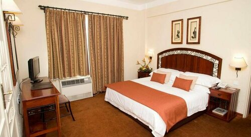 New Ambassador Hotel, Забронировать Отель Отели в центре Хараре, в центре