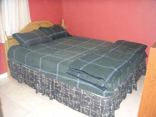Roy's Townhouse, Reservar Hotel Hotéis em Mindanao com Estacionamento, Estacionamento