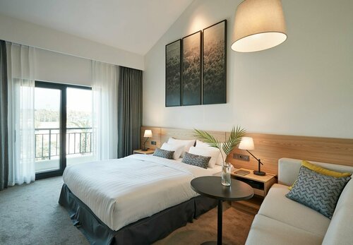 The Suites Hotel Jeju, Забронировать Отель Бизнес-отели Согвипхо, рядом с Отель и казино Lotte Jeju, 4* 5*