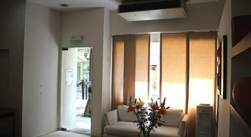 Premiere Arenales Suites, Забронировать Отель Реколета провинция Буэнос-Айрес