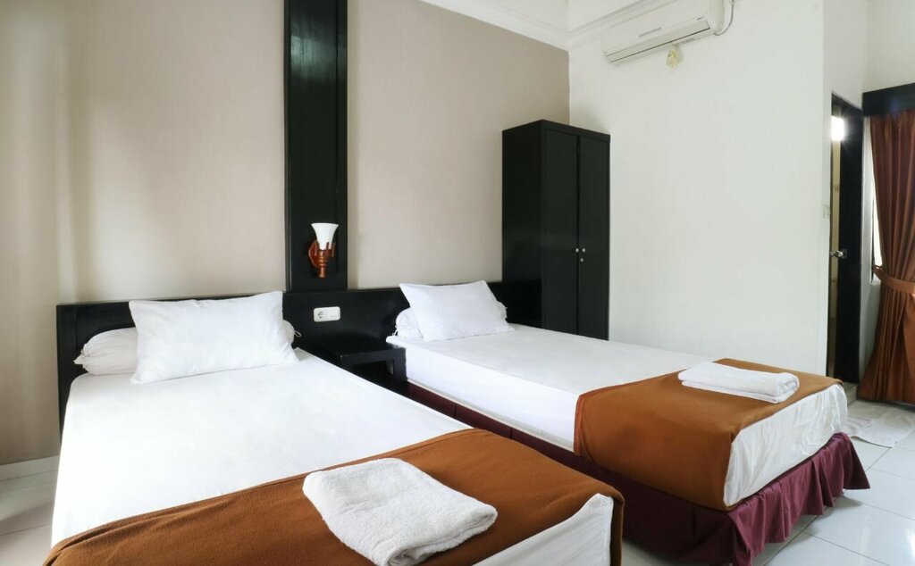 Warapsari Inn by Nida Rooms