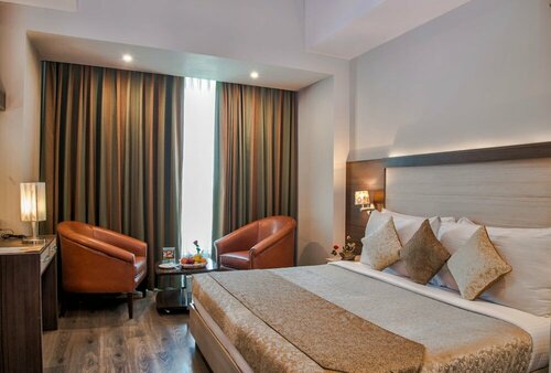 Hide Away Suites, Забронировать Отель Отели Нойда с завтраком, Завтраки