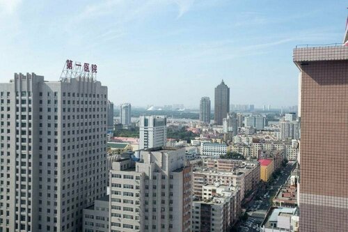 Harbin Riceshop Youth Hostel, Boek Hotel Harbin Heilongjiang