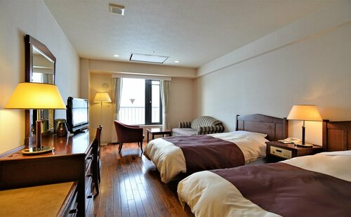Higashikawa Asahidake Onsen Hotel Bear Monte, Забронировать Отель Отели и гостиницы Биэй, Отель